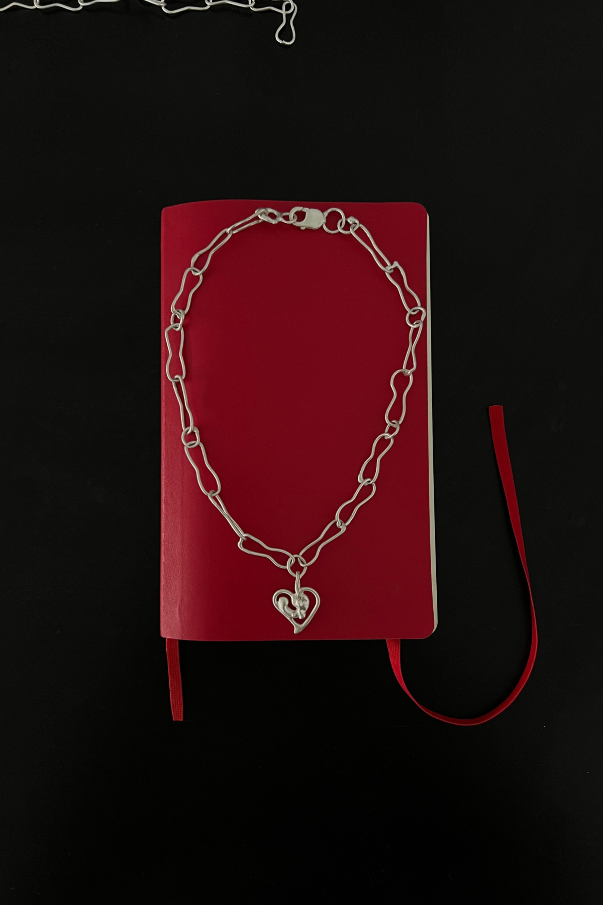MOLTEN HEART PENDANT